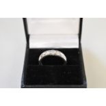 A pave set solitaire diamond platinum ring,Â  stamped 950,Â approximately .25ct, 11.5g all in.