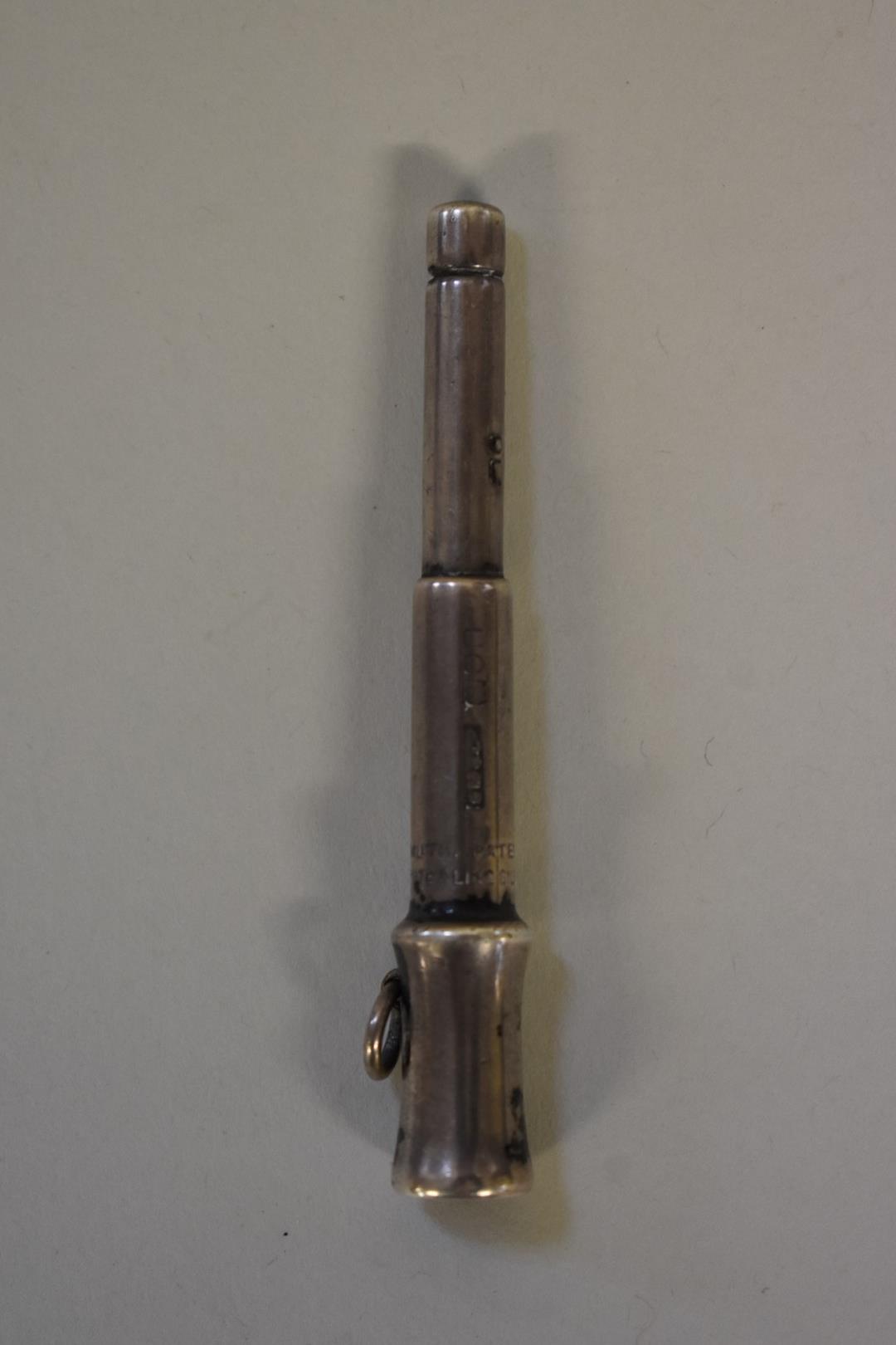 A silver cigar piercer, by Sampson Morden & Co, marks rubbed.