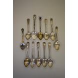 Eleven silver teaspoons, 125g all in; together with an Italian 800 silver gilt and enamel souvenir