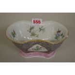 A Chinese famille rose bowl,Â DaoquangÂ seal mark, of shaped outline, the interior painted with