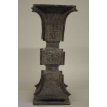 A large ChineseÂ ArchaisticÂ bronze gu vase,Â probably Ming,Â 37cm high.