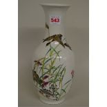 A Chinese porcelain vase, painted with geese and bamboo, 30cm high.