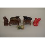 A mixed group of Oriental items,Â to include a carved wood lion dog, 6.5cm high.