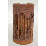 A bamboo brushpotÂ Bitong,Â carved with the Seven Sages of the Bamboo Grove, 15cm high.