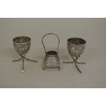 A pair of Chinese silver egg cups, by Wang Hing, decorated with bamboo, 7cm high, 97g; together with