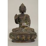 A Sino-Tibetan bronze Buddha, 18.5cm high.