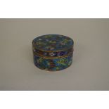 A Chinese cloisonne enamel circular box and cover, Ming/Qing, 9.5cm wide.