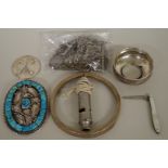 A group of silver and metal items, to include: a Native American buckle; and silver chains.
