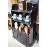 An old ebonized waterfall bookcase, 79cm wide.