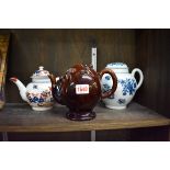 A 19th century Brameld brown glazed Cadogan teapot; 15cm high; together with another late 18th