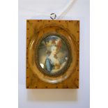 A half-length portrait miniature of a French lady, 45 x 3.7cm, in a simulated tortoiseshell frame.