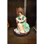 A Royal Doulton figure of 'The Leisure Hour', HN2055.