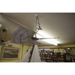 Two similar vintage aluminium ceiling light fans.