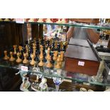 An English boxwood and ebonized Staunton pattern chess set, King 9cm, Pawn 4.6cm, in mahogany box.