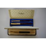 A Parker 61 fountain pen, boxed and with instructions; together with another boxed Parker pen set.