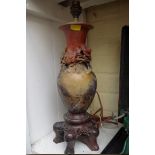 An Oriental soapstone lamp, height excluding fitting 35.5cm.