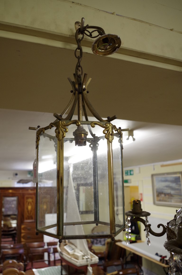 A glass and brass hexagonal hall lantern, 32cm high.