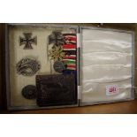 Medals: a World War II German Afrikakorps medal group and combat awards, in associated fitted box.