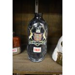 A Royal Doulton for Skinner & Rook flagon, 21cm high.