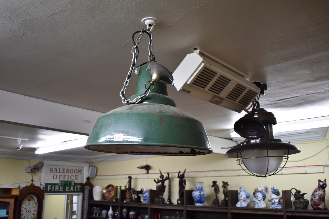 A vintage green enamelled industrial ceiling light, 46cm diameter; together with two further smaller