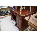 A late Victorian mahogany pedestal desk, 122cm wide.