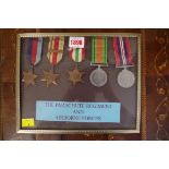 A World War II Parachute Regiment beret, dated 1944; together with framed display of related medals;