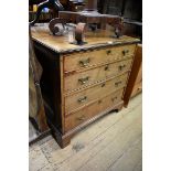 A George III mahogany and crossbanded four drawer chest, 78cm wide.