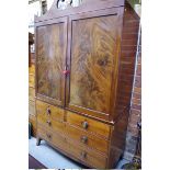 A 19th century mahogany linen press, with hanging area, 122cm wide.