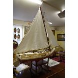 A large pond yacht model of a shallow drafted sailing vessel, overall length 164cm.