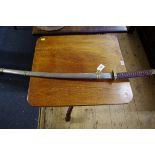 A Japanese katana and steel scabbard.