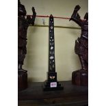 A Victorian slate and pietra dura obelisk, 42cm high.