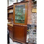 A 19th century mahogany and line inlaid standing corner cupboard, with glazed upper section, 76cm