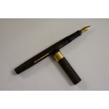 An 18ct gold mounted vintage Mabie Todd fountain pen, with 14ct nib.