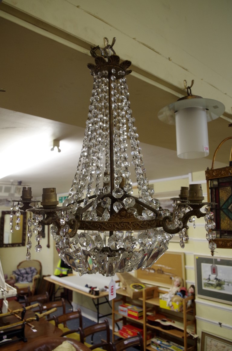 An old brass and faceted glass five branch chandelier, 55cm high.