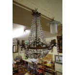 An old brass and faceted glass five branch chandelier, 55cm high.