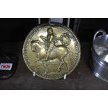 An antique bronze circular relief plaque of Oliver Cromwell in armour on horseback, 14.5cm