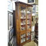 A George III walnut standing corner display cupboard, 115cm wide.