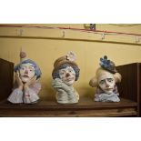 Three Lladro clowns, to include, 'Melancholy', 5542; 'Sad Jester', 5129; and 'Pensive', 5130.