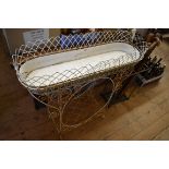 A Victorian white painted wirework planter, 88cm wide.