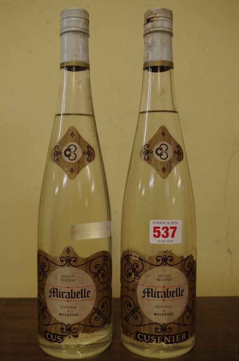 Two 24 1/2 fl.oz. bottles of Cusenier Mirabelle Vieille Reserve. (2)