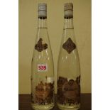 Two 24 1/2 fl.oz. bottles of Cusenier Framboise Vieille Reserve. (2)