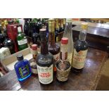 Six various liqueurs, to include: a 35 fl.oz. Bols Apricot; a 70cl Peter Heering Cherry; a 35cl