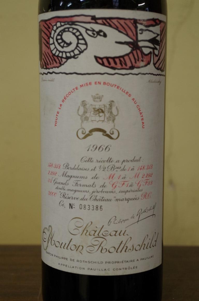 A 75cl bottle of Chateau Mouton Rothschild 1966, No. 083386. - Image 2 of 3