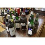 A mixed lot of eight various bottles, to include port and sherry.