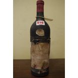 A bottle of Mouton Cadet 1949, Baron Philippe de Rothschild.