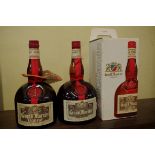 Two 1 litre bottles of Grand Marnier liqueur, one in card box. (2)