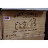 A case of twelve 75cl bottles of Chateau Haut Carles, 2003, in owc. (12)PLEASE NOTE: ADDITIONAL