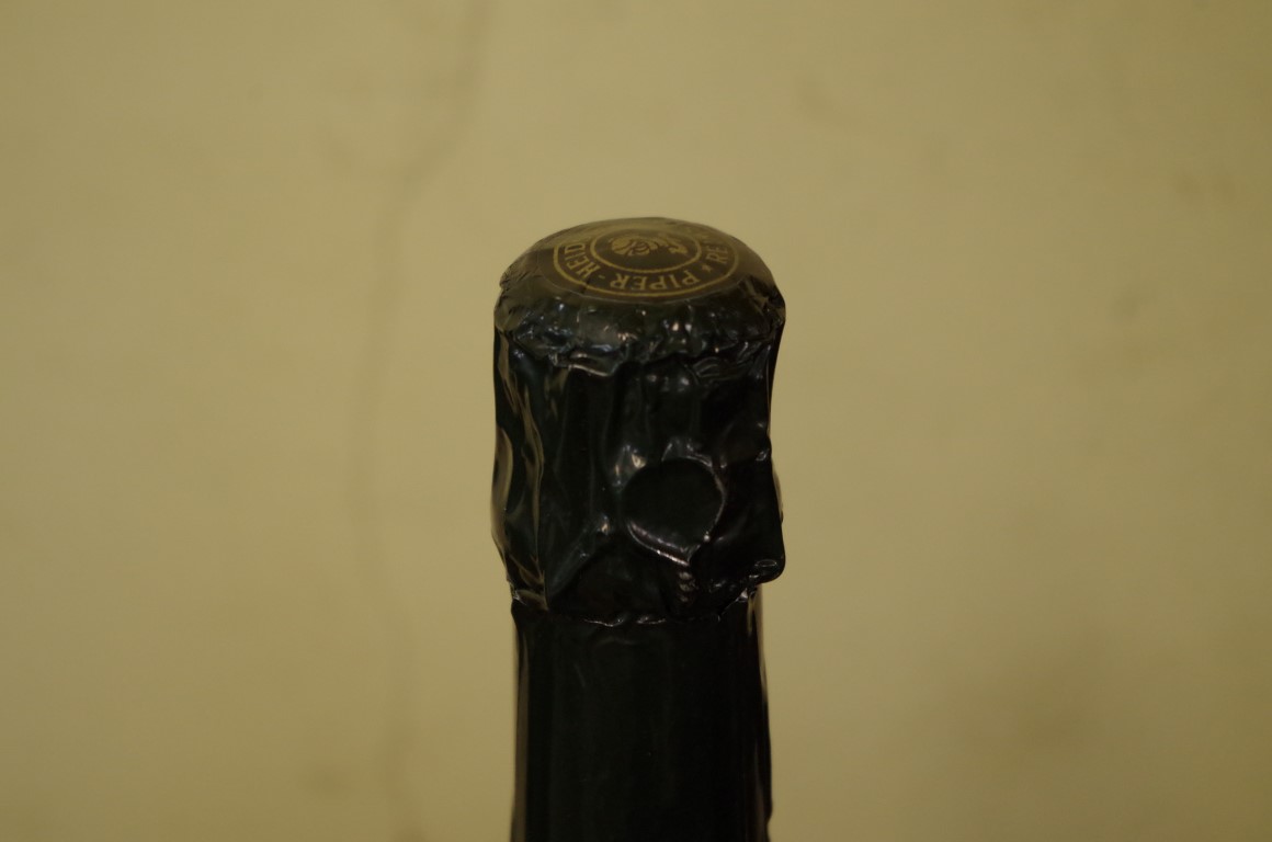 A 75cl bottle of Florens-Louis Piper Heidsieck 1973 vintage champagne. - Image 3 of 3