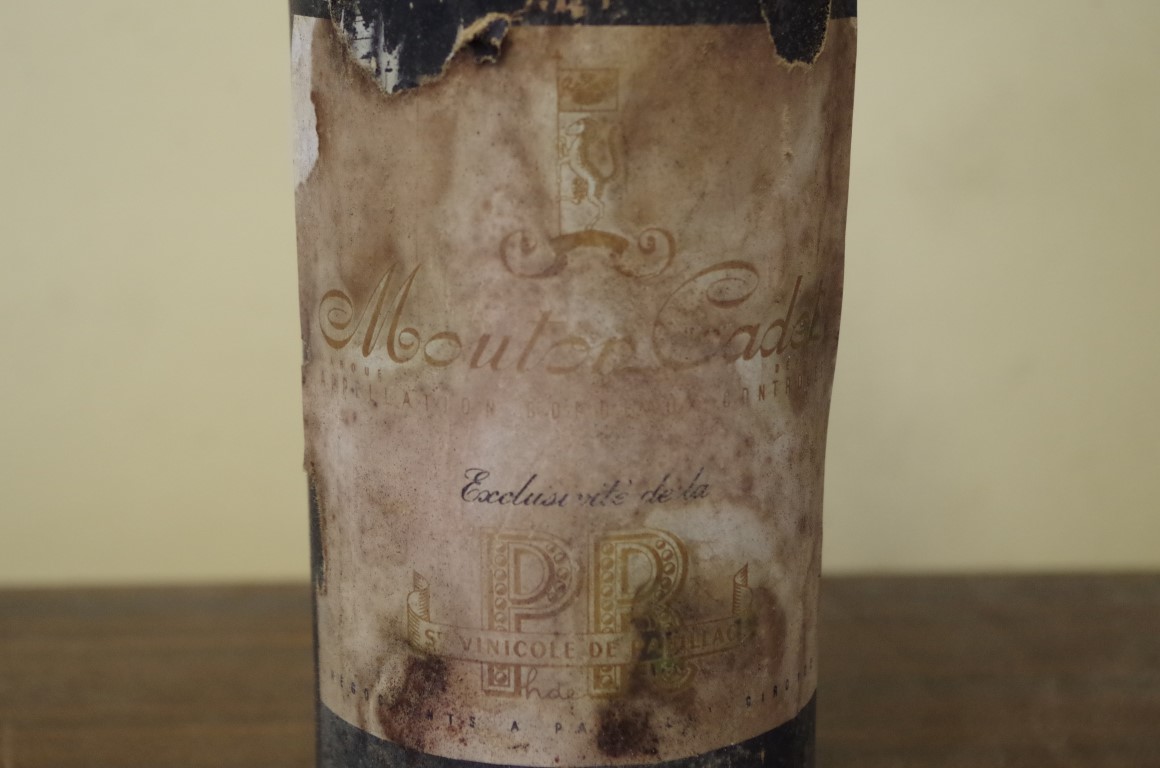 A bottle of Mouton Cadet 1949, Baron Philippe de Rothschild. - Image 2 of 3