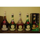 Four various bottles of Benedictine DOM liqueur, comprising: two 1 litre bottles; a 70cl bottle,